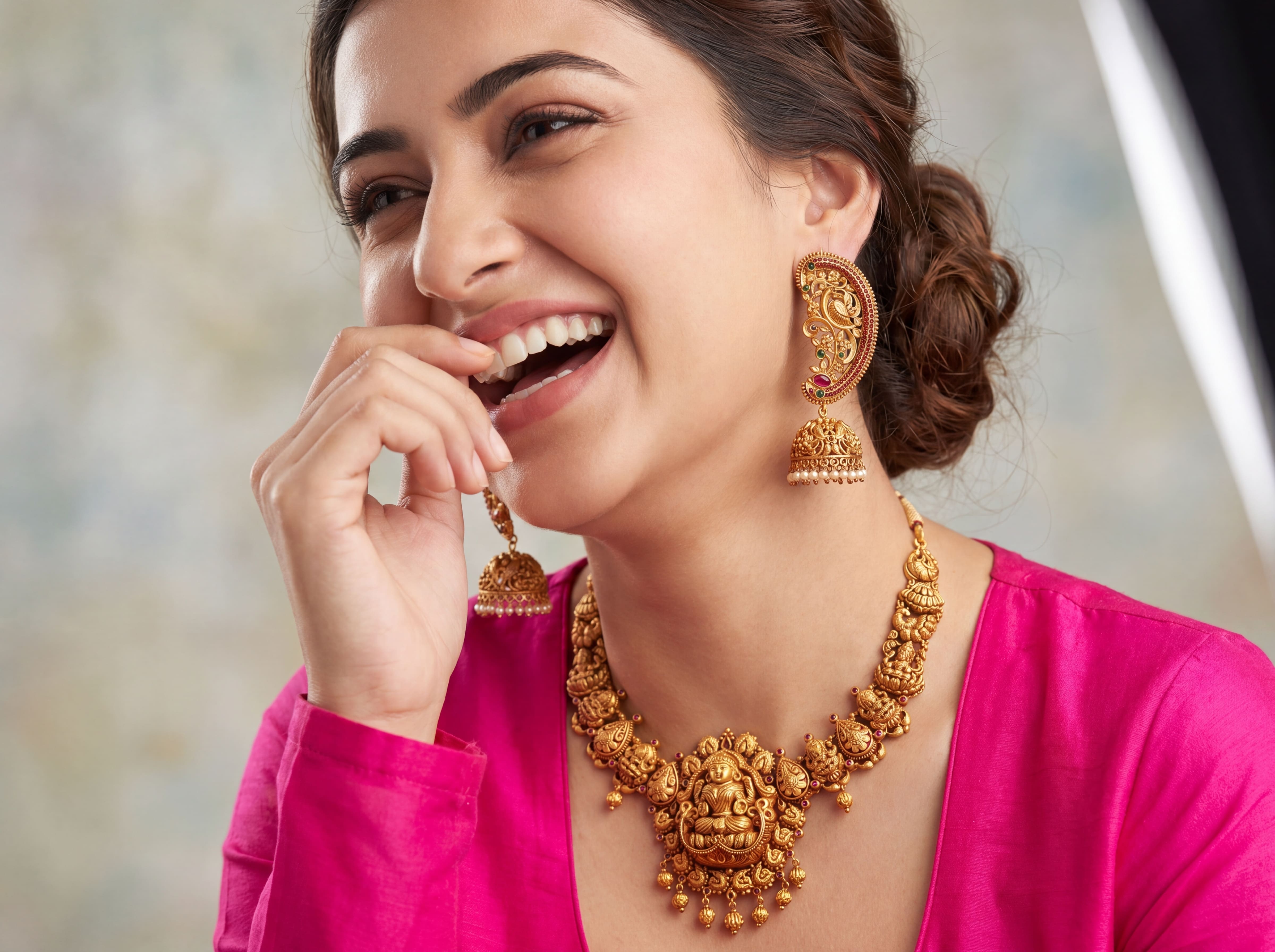Model wearing the jewellery set with a joyful expression